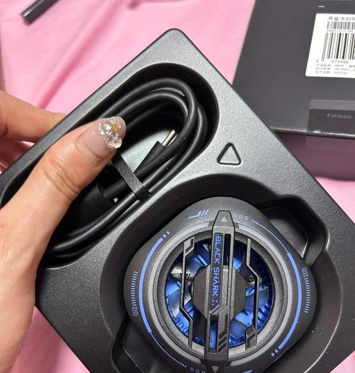 大头摄像头手机使用散热器的方法是什么？散热器对手机有何好处？
