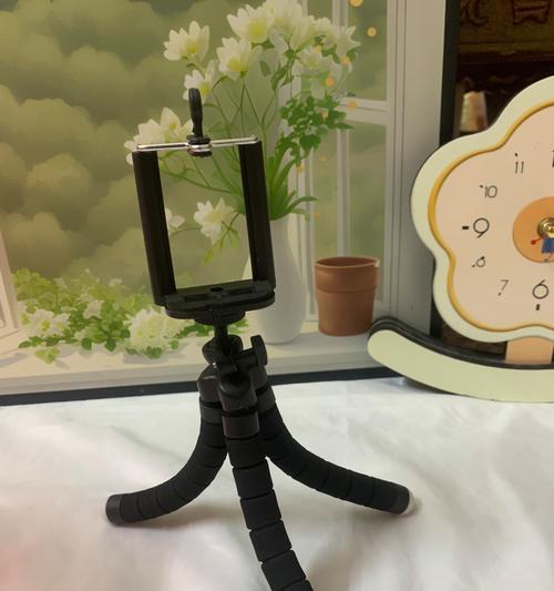 使用三脚架拍摄两部手机的技巧是什么？